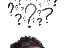 Young persons head looking with gesture at writing marks